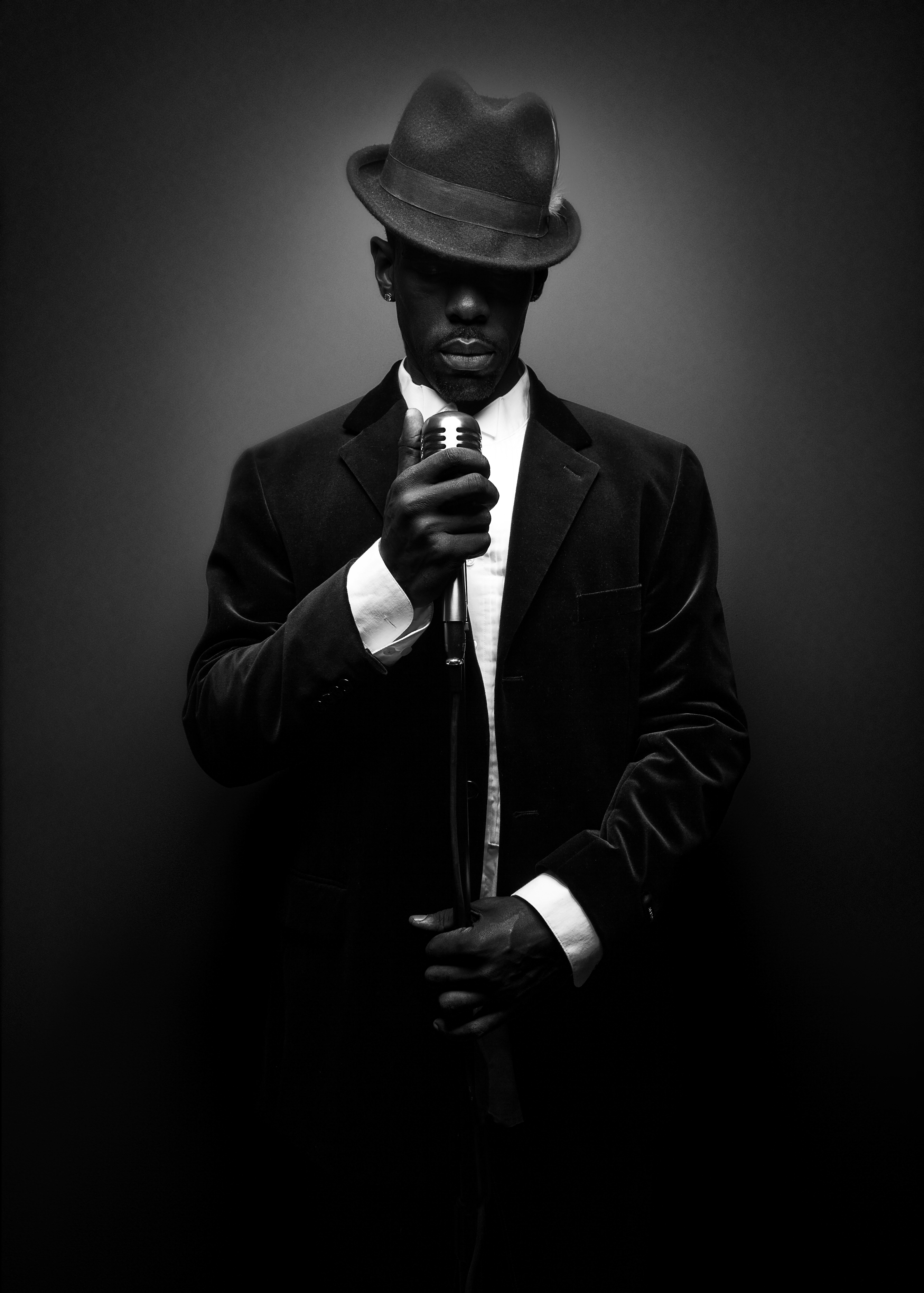 Black Musician Holding Microphone | Dovis Bird Agency Photography