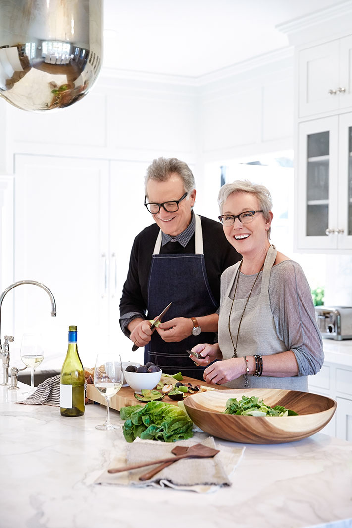 Middle age couple preparing meal at home  | Dovis Bird Agency Photography