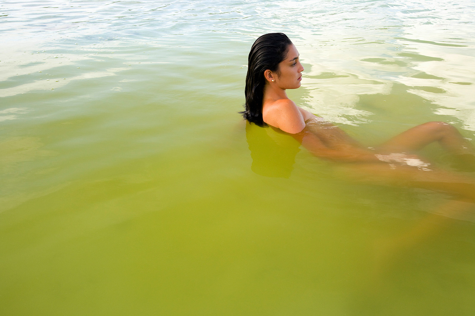Woman soaking in sea salts at spa  | Dovis Bird Agency Photography